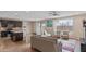 Open-concept living area with a spacious kitchen and an abundance of natural light at 2855 E Tina Dr, Phoenix, AZ 85050