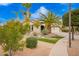 Inviting home exterior showcasing lush landscaping, a well-maintained lawn, and a welcoming entrance at 2878 E Tonto Dr, Gilbert, AZ 85298