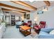 Living room with a skylight, wood beams, and modern furniture at 3002 N 32Nd St # 13, Phoenix, AZ 85018
