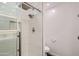 Modern shower featuring white tiling and brushed silver fixtures at 3002 N 32Nd St # 13, Phoenix, AZ 85018