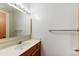Standard bathroom features vanity with a mirror and lighting fixture at 3264 E Vineyard Rd, Phoenix, AZ 85042
