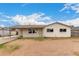 Charming single-story home featuring a covered carport and well-lit facade with a mix of desert landscaping at 3626 W Elm St, Phoenix, AZ 85019