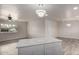 An open-concept layout that seamlessly blends living, dining, and kitchen areas at 3626 W Elm St, Phoenix, AZ 85019
