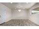 Bright, versatile room featuring attractive flooring and a modern light fixture, perfect for dining or living at 3626 W Elm St, Phoenix, AZ 85019