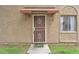 Up-close front door of a cozy home with a secure screen door and covered awning at 4258 N 68Th Dr, Phoenix, AZ 85033