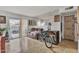 Bright living room with a sliding glass door, and tiled floors at 4258 N 68Th Dr, Phoenix, AZ 85033