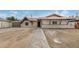 Delightful single-level home featuring a charming red tile roof, a garage, and a convenient driveway at 4335 W Monterey Way, Phoenix, AZ 85031