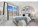 Serene bedroom with natural light, neutral decor, and carpeted flooring at 440 E Aurora Dr, San Tan Valley, AZ 85140