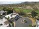 Stunning aerial view of a home situated on a cul-de-sac, backing to a golf course and mountain views at 4605 E Valley View Dr, Phoenix, AZ 85044