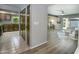 This open floorplan features a living room with sliding glass doors for indoor/outdoor living at 4605 E Valley View Dr, Phoenix, AZ 85044