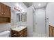 Well-lit bathroom with a vanity, double mirrors and sink, plus a shower stall at 4608 W Maryland Ave # 122, Glendale, AZ 85301