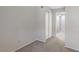Cozy carpeted bedroom featuring a closet and doorway at 4608 W Maryland Ave # 122, Glendale, AZ 85301