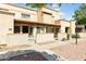 Inviting townhome exterior with a well-maintained walkway and covered patios at 4608 W Maryland Ave # 122, Glendale, AZ 85301
