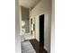 Open bathroom view showcasing a glass enclosed shower, closet, neutral color palette, and modern design at 4751 E White Aster St, Phoenix, AZ 85044