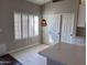 Bright breakfast nook with shutters, tile flooring, and sliding closet doors at 4751 E White Aster St, Phoenix, AZ 85044