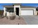 Charming single-story home featuring a two-car garage, neutral stucco, and low-maintenance desert landscaping at 4919 S 106Th Ave, Tolleson, AZ 85353
