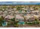 Expansive aerial view showcases neighborhood, amenities, and pool at 5332 W Linda Ln, Chandler, AZ 85226
