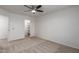 Bedroom with neutral carpet leading to walk-in closet with built-in shelves at 5332 W Linda Ln, Chandler, AZ 85226