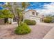 Charming two-story home featuring a three-car garage and desert landscaping at 5332 W Linda Ln, Chandler, AZ 85226