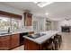 Kitchen featuring countertop seating and natural lighting at 5332 W Linda Ln, Chandler, AZ 85226