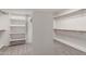Well-organized walk-in closet with built-in shelving and ample storage space at 5332 W Linda Ln, Chandler, AZ 85226