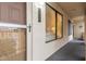 Exterior facade of unit showing front door, with secure screen door, and windows providing lots of light at 5518 E Lindstrom Ln # 2038, Mesa, AZ 85215