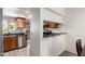 Well-lit kitchen featuring stainless steel appliances and warm wood cabinets, blending functionality with a charming design at 5518 E Lindstrom Ln # 2038, Mesa, AZ 85215