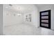 Bright and spacious living room with light walls, tile floors and lots of natural light at 5710 N 84Th Ave, Glendale, AZ 85305