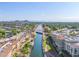 An aerial view shows the canal, bridges and buildings in a well-planned community setting at 6257 E Catalina Dr, Scottsdale, AZ 85251