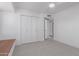 Bright bedroom featuring a ceiling fan and closet with paneled doors at 6349 N 78Th St # 123, Scottsdale, AZ 85250