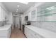 Bright kitchen featuring white cabinetry, stainless steel appliances, and marble countertops at 6349 N 78Th St # 123, Scottsdale, AZ 85250