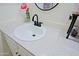 Modern bathroom with elegant white sink, matte black faucet, and stylish countertops at 646 W Los Lagos Vista Ave, Mesa, AZ 85210