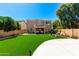Spacious backyard featuring a pristine lawn at 650 E Daniella E Dr, San Tan Valley, AZ 85140