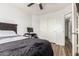 Bedroom featuring a closet and wood flooring at 650 E Daniella E Dr, San Tan Valley, AZ 85140