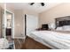Bright bedroom with a double bed, closet, and wood floors at 650 E Daniella E Dr, San Tan Valley, AZ 85140