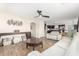 Spacious living room with modern finishes open to kitchen and featuring comfortable seating at 650 E Daniella E Dr, San Tan Valley, AZ 85140