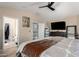 Large main bedroom with vaulted ceiling and bathroom access at 650 E Daniella E Dr, San Tan Valley, AZ 85140