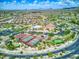 Aerial view showcasing the community amenities, including a pool, tennis courts, and well-maintained landscaping at 8359 E Ingram Cir, Mesa, AZ 85207