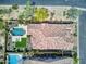 Aerial view of a backyard featuring a swimming pool and a tiled roof at 8359 E Ingram Cir, Mesa, AZ 85207
