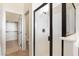 Bathroom showcasing a glass-enclosed shower and an adjacent toilet room at 8359 E Ingram Cir, Mesa, AZ 85207