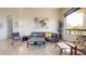Inviting living area with a cozy sofa, accent chairs, and ample natural light at 8359 E Ingram Cir, Mesa, AZ 85207