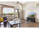 Living room with tile flooring and sliding glass doors leading to outdoor space at 8359 E Ingram Cir, Mesa, AZ 85207