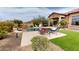Inviting backyard boasts a sparkling pool, lush landscaping, and plenty of patio space for relaxing at 8359 E Ingram Cir, Mesa, AZ 85207