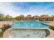 Outdoor swimming pool with fountains, tile trim, and lounge chairs around the deck at 8359 E Ingram Cir, Mesa, AZ 85207