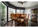 Bright breakfast nook with large windows offering views of the outdoor living space at 8369 E Del Camino Dr, Scottsdale, AZ 85258