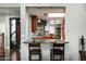 Open concept kitchen featuring granite countertops and stainless steel appliances at 8369 E Del Camino Dr, Scottsdale, AZ 85258