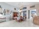 Inviting dining room with an open layout, stylish chandelier, and ample seating for Gathering gatherings at 8568 W Purdue Ave, Peoria, AZ 85345