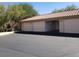 Spacious three-car garage with ample parking on a paved driveway at 9253 N Firebrick Dr # 143, Fountain Hills, AZ 85268