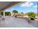 Relax on this back patio with beautiful golf course views and lush landscaping at 15560 W Clear Canyon Dr, Surprise, AZ 85374