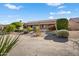 Charming backyard with desert landscaping, perfect for enjoying the serene outdoor setting at 15560 W Clear Canyon Dr, Surprise, AZ 85374